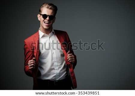 Similar – Image, Stock Photo Man with red jacket, red shoes and red cap on skis checks ice thickness of a lake with a ski pole