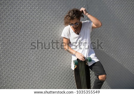 Similar – Athlete at the city park warming and stretching