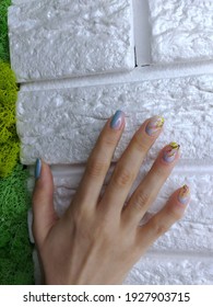 stylish manicure design in gentle spring  summer shades  Pink and blue color smooth transition ombre gradient nails  Drawing bird in different shades