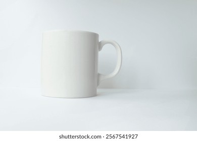 Stylish and minimalist 11 oz white ceramic mug mockup in white, ideal for graphic designers to showcase their logo, brand or artwork. Its clean design and quality make it perfect for presentation.