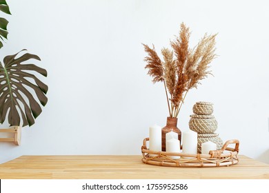 Stylish mockup with beige autumn dry flowers, fall concept. Minimal home still life background.