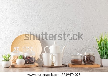 stylish modern kitchen background. environmentally friendly items on a marble countertop against a white brick wall. kitchen decor concept.