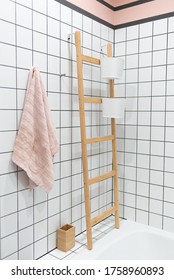 Stylish Modern Scandinavian Loft Bathroom Interior: Pretty White Square Tiles, Towel Rack, Storage Containers And Cotton Towel