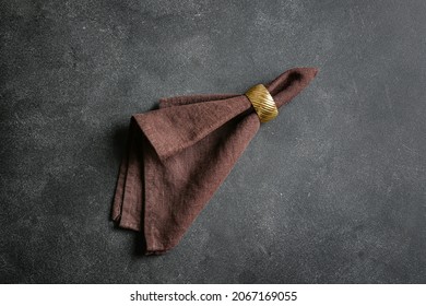 Stylish Napkin With Ring On Dark Background