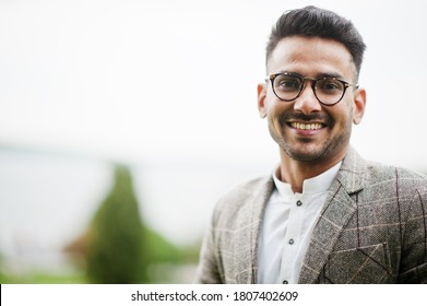 Stylish Pakistani Man Wear In Eyeglasses And Jacket.