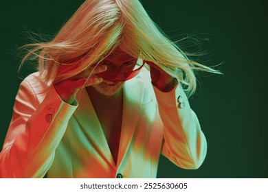 stylish person with long blonde hair wearing sunglasses, dressed in a white suit, posed against a vibrant green background with dramatic lighting effects - Powered by Shutterstock