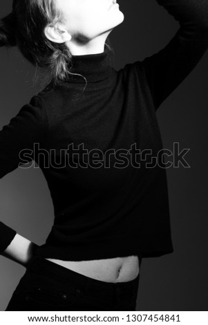 Similar – fashionable girl in black glasses sitting on an iron barrel