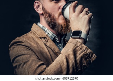 Stylish Redhead Bearded Hipster Male Drinks Coffee.