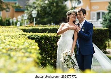 Stylish Rich Cute Couple On The Background Spring Garden