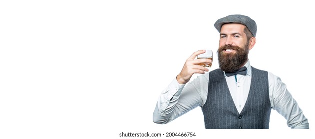 Stylish Rich Man Holding A Glass Of Old Whisky. Bearded Gentleman Drink Cognac. Sipping Finest Whiskey. Portrait Of Man With Thick Beard. Macho Drinking.