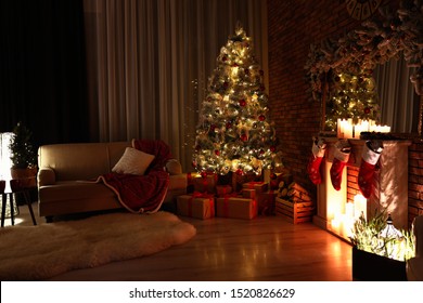 Stylish Room Interior With Beautiful Christmas Tree In Evening