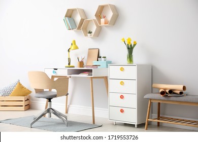 Stylish room interior with modern comfortable workplace - Shutterstock ID 1719553726