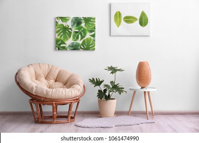 Stylish Room Interior With Tropical Leaves And Papasan Chair