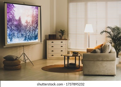 Stylish Room With Modern Video Projector And Comfortable Sofa