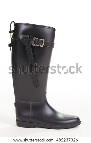 Similar – Image, Stock Photo Shiny rubber boots in the rain in front of a puddle-