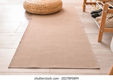 Stylish rug in interior of modern hallway, closeup