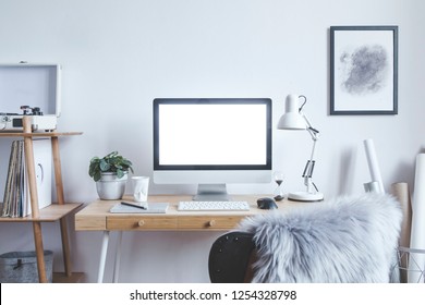 Stylish Scandinavian Interior Of Home Creative Desk With Mock Up Computer Screen, Poster Frame, Plants, Bookstand And Gramophone. Minimalistic Space For Work, Hobby And Listen Music. Freelancer Zone.