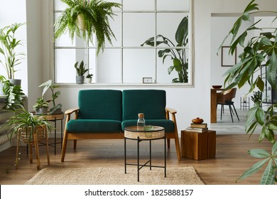 Stylish Scandinavian Living Room Interior With Green Velvet Sofa, Coffee Table, Carpet, Plants, Furniture, Elegant Accessories In Modern Home Decor. Template.