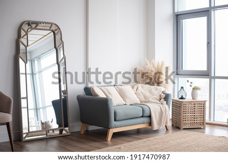 Stylish Scandinavian modern white cozy eco interior in minimalist style.Modern home decor. Open space. Foto stock © 