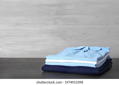 Stylish School Uniform On Dark Table