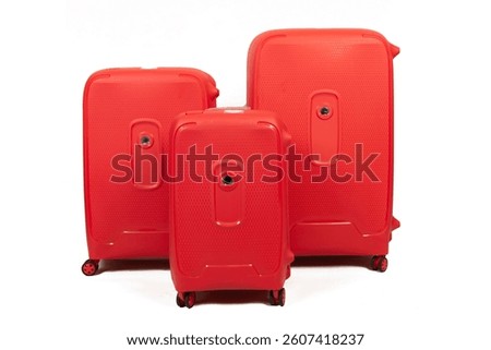 A stylish set of three hard-shell suitcases in a warm peach color, perfect for travel. Durable, modern, and elegant luggage for all your trips.