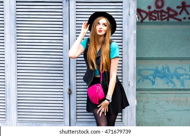 Stylish Sexy Blonde Woman Posing On The Street, Wearing Hipster Bright Outfit, Playful Cool Emotions, Fun, Enjoy, Happy Vacation Alone, Vintage Hat And Mini Skirt.