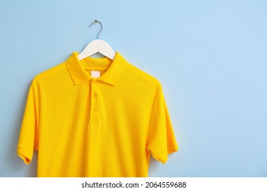 Stylish Shirt Hanging On Color Background