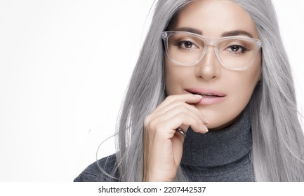 Stylish Silver Haired Woman Wearing Eyeglasses. Optic Eyewear, Clear Vision And Eyecare Concept. Head Shot Studio Portrait On White Background With Copy Space