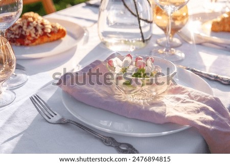 Similar – Image, Stock Photo Elegant spring table setting with nest and eggs