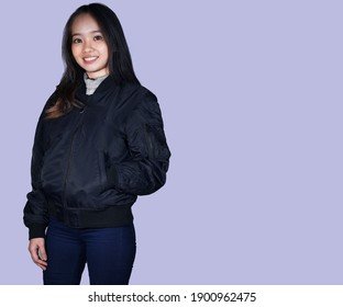 Stylish Teenage Girl Wearing A Black Bomber Jacket