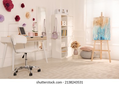 Stylish Teenager's Room Interior With Computer And Painting Easel