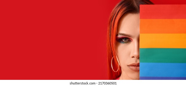 Stylish Transgender Woman And Flag Of LGBT On Red Background With Space For Text