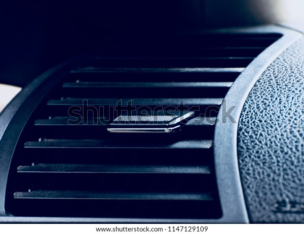Stylish ventilation system of a car air cooler\
isolated unique photo