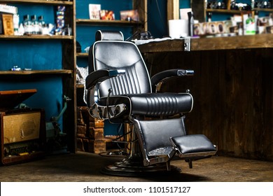 Stylish vintage barber chair. Barbershop theme. Professional hairstylist in barbershop interior. Barber shop chair. Barbershop armchair, modern hairdresser and hair salon, barber shop for men.