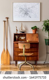 Stylish And Vintage Interior Design Of Living Room With Wooden Retro Commode,  Plants, Ships, Paddle, Map And Elegant Personal Accessories. Mock Up Poster Frame On The Wall. Template. Home Decor.