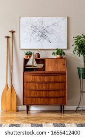 Stylish And Vintage Interior Design Of Living Room With Wooden Retro Commode, Plants, Ships, Paddle, Map And Elegant Personal Accessories. Mock Up Poster Frame On The Wall. Template. Home Decor.