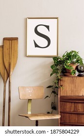 Stylish And Vintage Interior Design Of Living Room With Wooden Retro Commode, Plants, Ships, Paddle, Map And Elegant Personal Accessories. Mock Up Poster Frame On The Wall. Template. Home Decor.