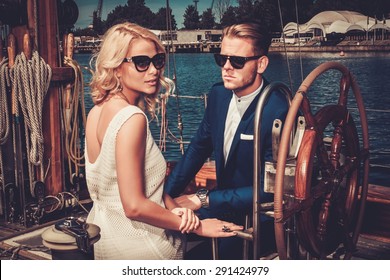 SAYKA stylish wealthy couple on luxury 260nw 291424979