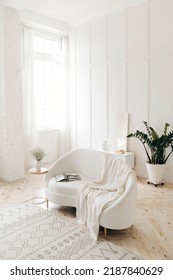 Stylish White Living Room With White Leather Sofa. Potted Plant At Home. Large Windows In The Interior. Nobody.