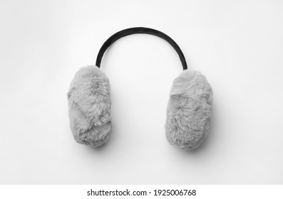 Stylish winter earmuffs on white background, top view - Shutterstock ID 1925006768