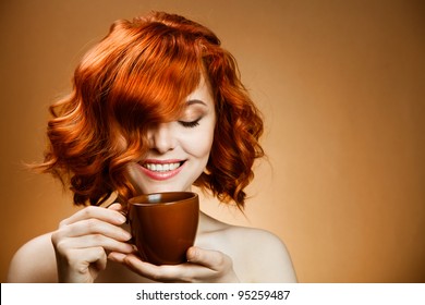 Stylish woman with an aromatic coffee in hands