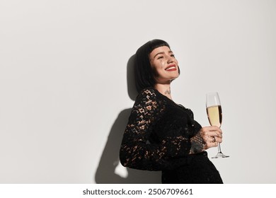 A stylish woman celebrates with a glass of champagne, radiating joy and confidence. - Powered by Shutterstock