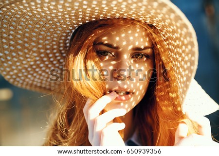 Similar – Young redhead woman covering from sun