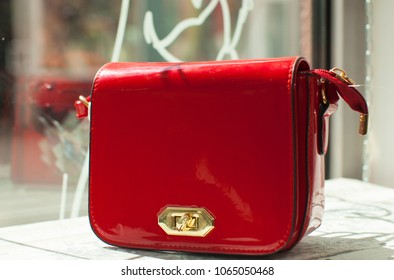 Stylish Woman Red Bag, Gloves And A Scarf Isolated On White Background. Collage. Professional Photo Session. 