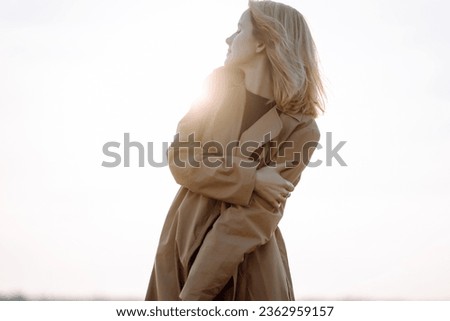 Similar – Image, Stock Photo Happy blonde woman with sunglasses and a hat enjoying the sun in nature