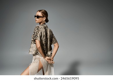 Stylish woman sporting sunglasses and a trendy snakeskin shirt. - Powered by Shutterstock