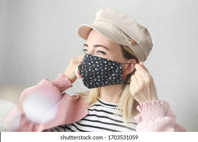 Stylish Woman Wearing Designer  Cloth Cotton Face Mask With Flower Protect Against Coronavirus.  Reusable Fashionable Face Mask.