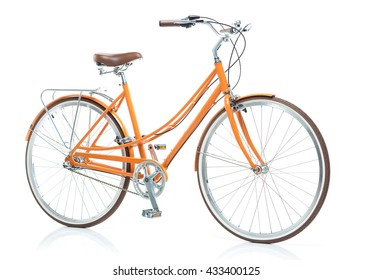 Stylish womens orange bicycle isolated on white background