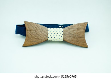 Stylish Wooden Bowtie With Blue-white Soft Cloth Ribbon. Isolated