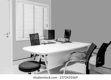 Stylish workspace with computer and bookshelves. office desk concept
